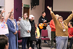 A group of participants at a singing and music session