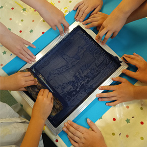 Young children doing a print activity