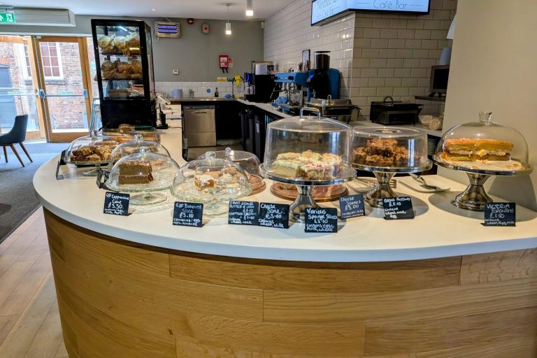 Cakes, sandwiches and baked treats displayed on the counter at Café Nineteen20.