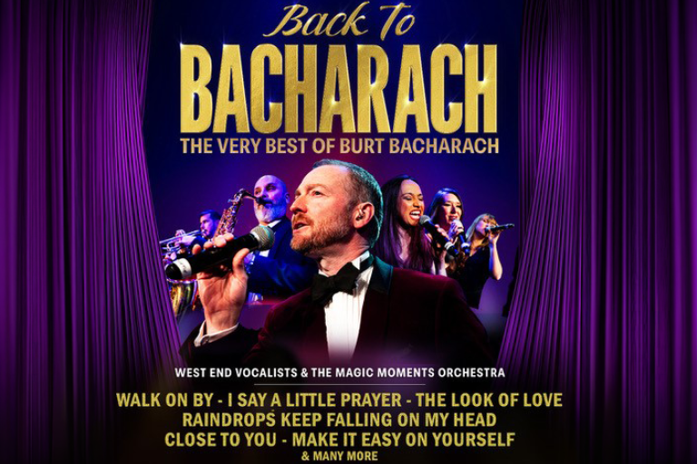 Promotional image for Back to Bacharach, featuring vocalists and musicians performing the timeless music of Burt Bacharach on a purple-lit stage.