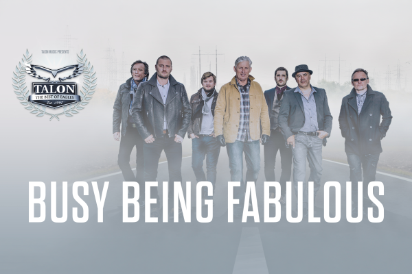 Promotional image for Talon: The Best of Eagles, featuring six performers on a misty road with the slogan “Busy Being Fabulous”.